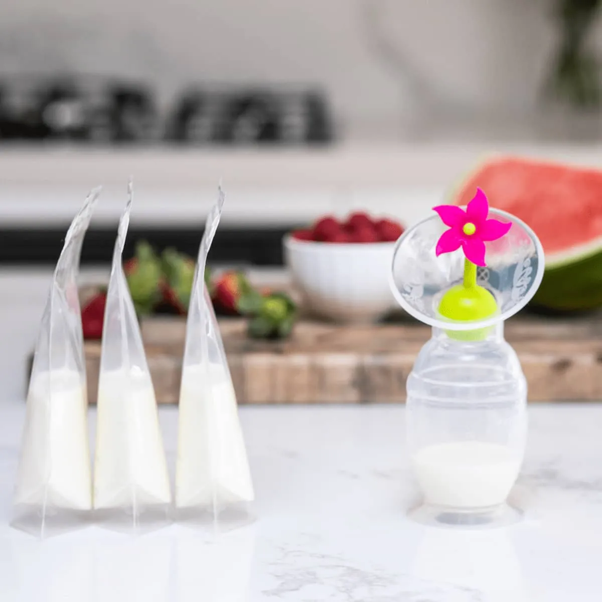 Haakaa Silicone Breast Pump with Suction Base and Flower Stopper